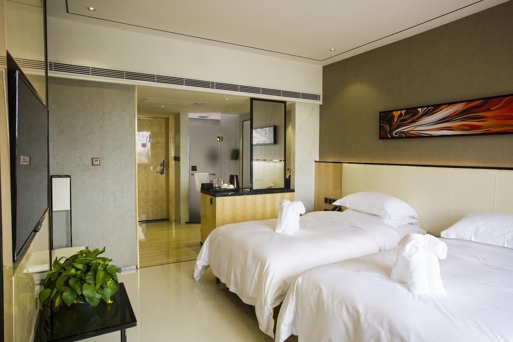 Lori Star Hotel Qionghai Pokoj fotografie