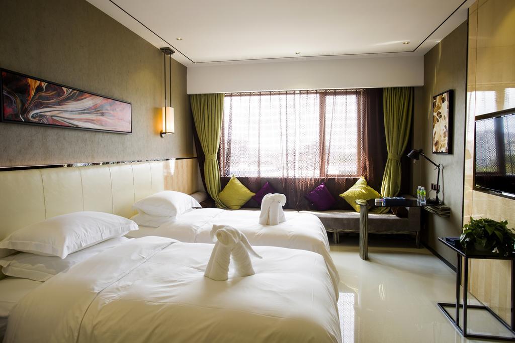 Lori Star Hotel Qionghai Pokoj fotografie